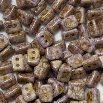 Korálek mačkaný TRIOS, 2 dírky,velikost 6x4 mm-barva 02010 zušlechtění 15695