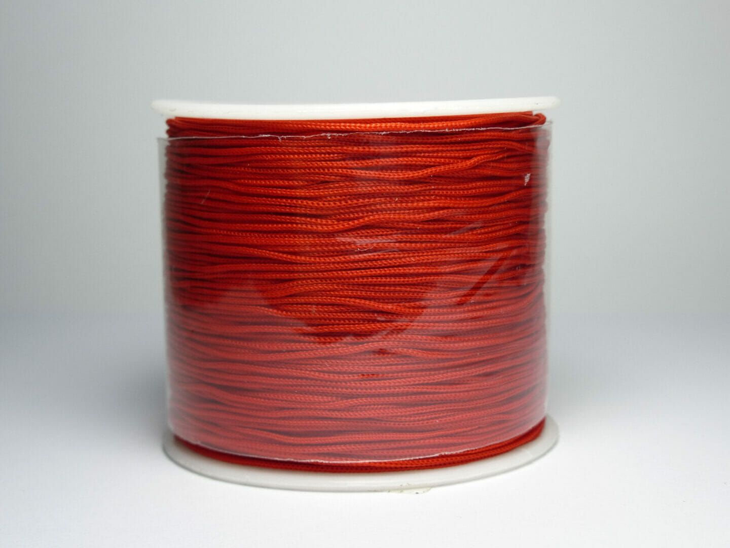 Šňůrka nylon, průměr 0,5 mm, délka 120 m, barva červená 1 Šňůrka nylon, průměr 0,5 mm, délka 120 m, barva červená