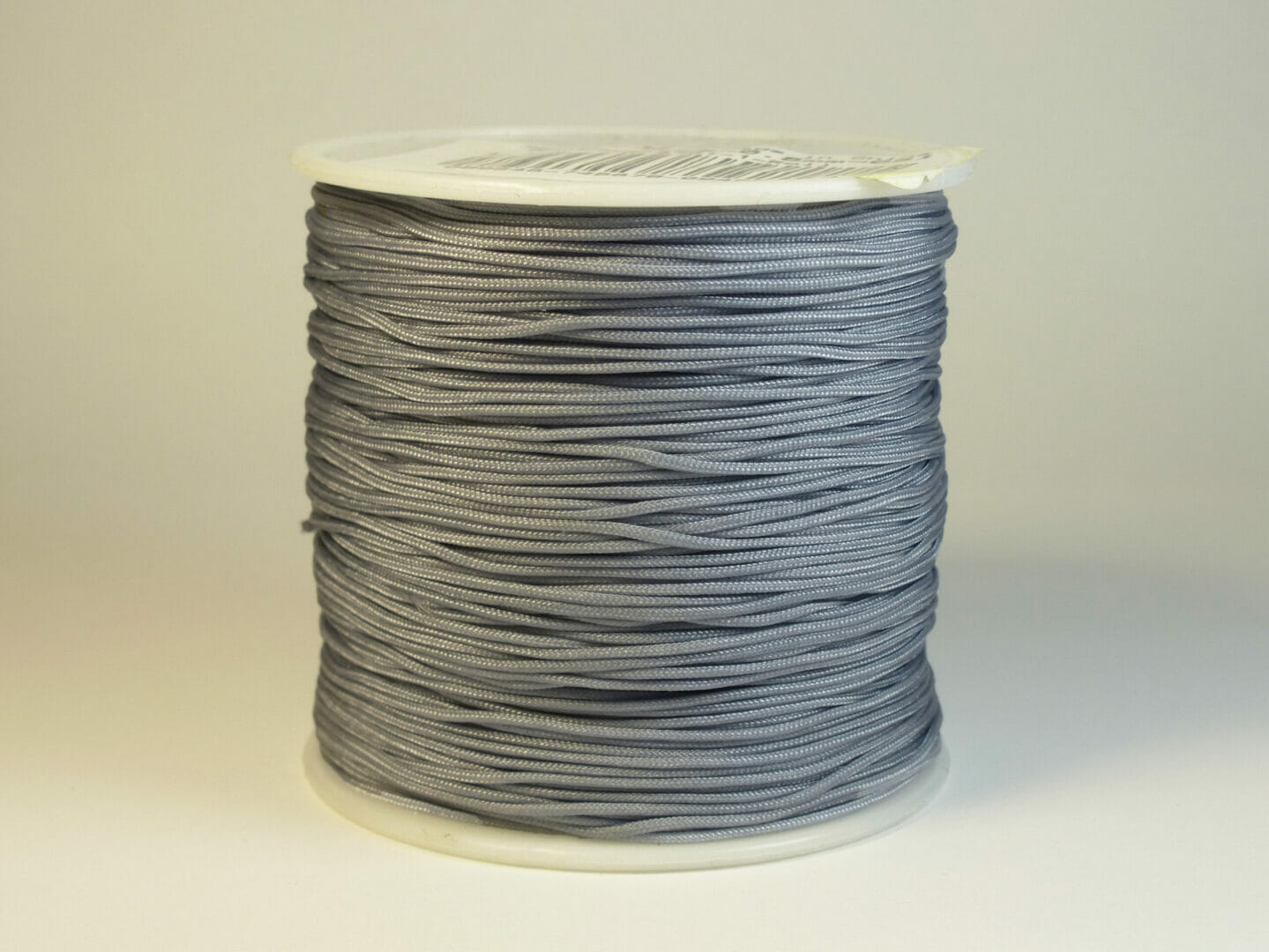 Šňůrka nylon, průměr 0,8mm, délka 91m, barva šedá 1 Šňůrka nylon, průměr 0,8mm, délka 91m, barva šedá