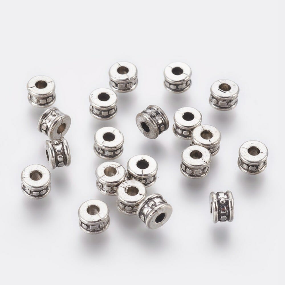 Kovový korálek velikost 4x6 mm,barva starostříbro 1 Kovový korálek velikost 4x6 mm,barva starostříbro