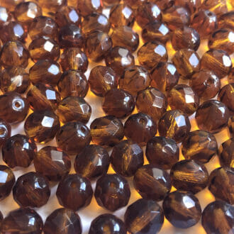 Korálek broušený, průměr 6mm, barva 10100-topaz